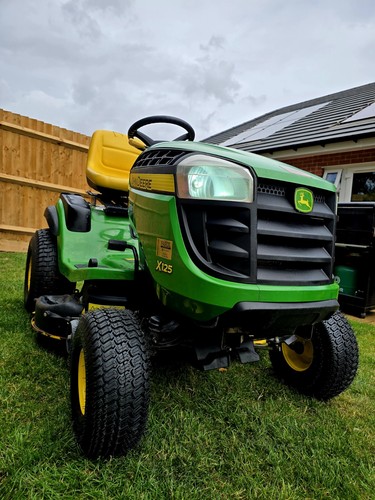 Johne deere x125 ride mower - deere, on